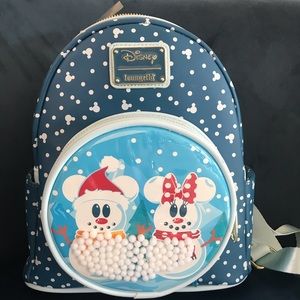 Christmas Mickey Snowglobe Loungefly bag.